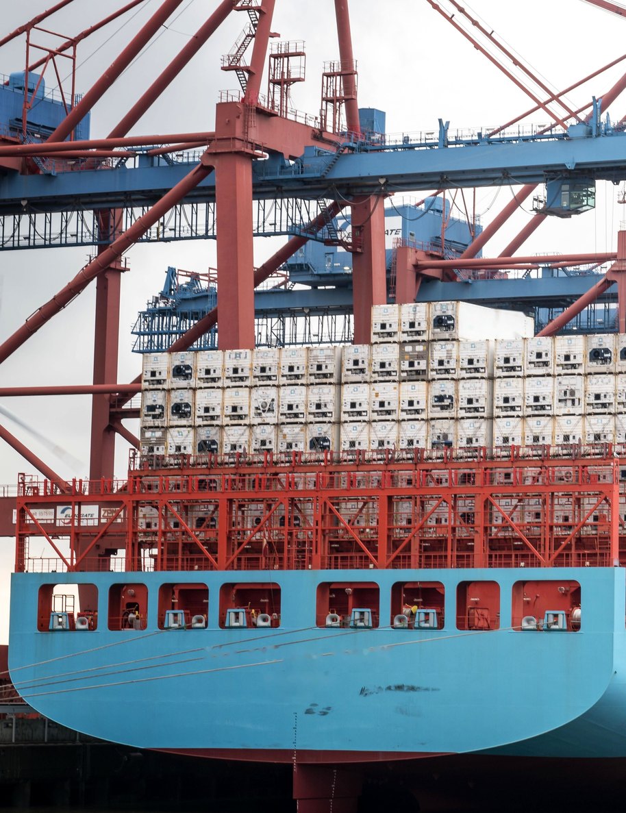 Container ship with reefers stacked on deck